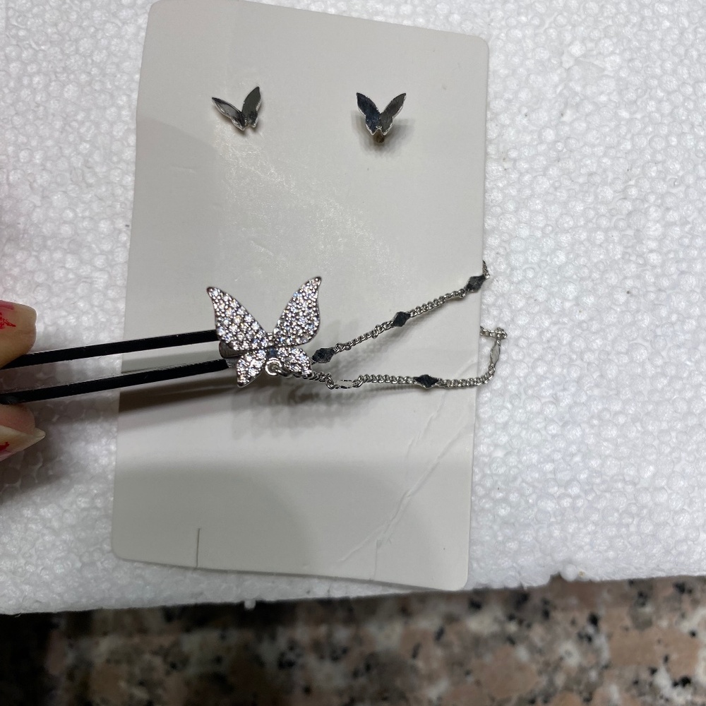 Butterfly faux silver earrings